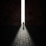 A door cracked open to reveal glowing light